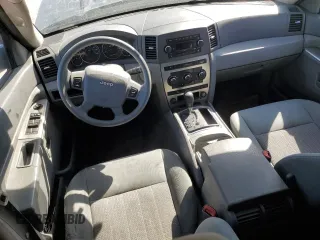 2007 Jeep Grand Cherokee Laredo with VIN 1J8GR48KX7C531824, listed as a Copart auction lot 49519015 with 175,453 mi miles and Salvage Title. Bid and sale history available at carsss.com. Image 8.