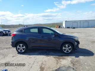 2018 Honda HR-V LX with VIN 3CZRU6H37JG708010, listed as a IAAI auction lot 42059990 with 100,822 mi miles. Bid and sale history available at carsss.com. Image 14.