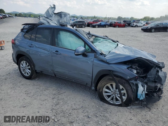 2023 Toyota Corolla Cross LE with VIN 7MUCAABG8PV066528, listed as a Copart auction lot 58902095 with 14,190 mi miles and Salvage title. Bid and sale history available at DreamBid. Image 4.