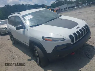 2015 Jeep Cherokee Trailhawk with VIN 1C4PJMBS3FW511564, listed as a IAAI auction lot 42424468 with 169,167 mi miles and . Bid and sale history available at DreamBid. Image 1.