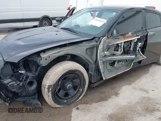 2013 Dodge Charger Police z VIN 2C3CDXAG5DH716369, wystawiony jako IAAI lot #41645644 z przebiegiem 127 535 mil mil oraz . Historia ofert i sprzedaży dostępna na DreamBid. Obrazek 6.