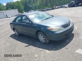 2003 Toyota Camry LE with VIN 4T1BE32K23U785060, listed as a IAAI auction lot 41825336 with 205,751 mi miles and . Bid and sale history available at DreamBid. Image 1.
