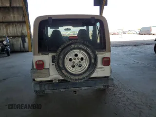 1999 Jeep Wrangler Sport с VIN 1J4FY19S9XP414239, выставлен на аукционе Copart как лот 66882505 с пробегом 131 916 миль миль и Чистый • Clean title. История ставок и продаж доступна на DreamBid. Изображение 6.