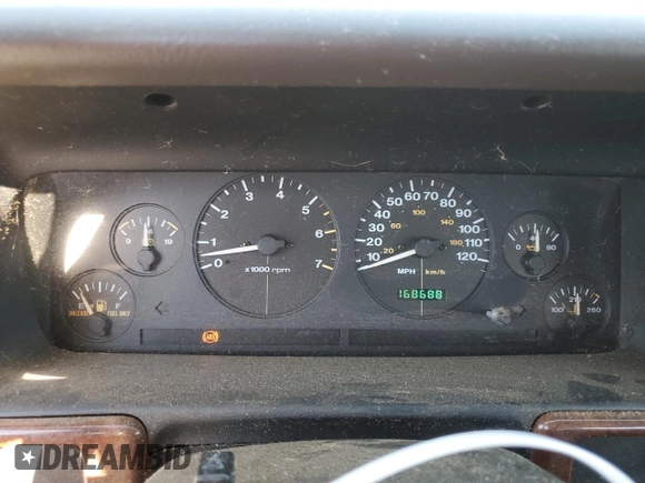1998 Jeep Grand Cherokee Laredo with VIN 1J4GZ58S5WC165213, listed as a Copart auction lot 77611434 with 168,688 mi miles and Salvage Title. Bid and sale history available at carsss.com. Image 9.
