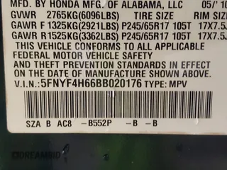 2011 Honda Pilot EX-L with VIN 5FNYF4H66BB020176, listed as a IAAI auction lot 41973659 with 238,745 mi miles and . Bid and sale history available at carsss.com. Image 9.