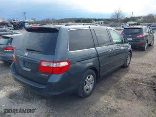 2005 Honda Odyssey EX-L with VIN 5FNRL38765B070922, listed as a IAAI auction lot 41868648 with 192,518 mi miles. Bid and sale history available at carsss.com. Image 4.