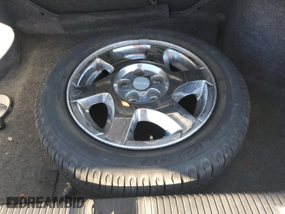 2005 Saturn L z VIN 1G8JD54R85Y501462, wystawiony jako Copart lot #87946305 z przebiegiem 170 548 mil mil oraz Szkoda całkowita • Salvage title. Historia ofert i sprzedaży dostępna na DreamBid. Obrazek 14.