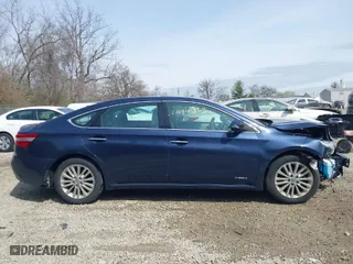 2014 Toyota Avalon Hybrid Limited with VIN 4T1BD1EB5EU024433, listed as a IAAI auction lot 41942865 with 142,377 mi miles. Bid and sale history available at carsss.com. Image 14.