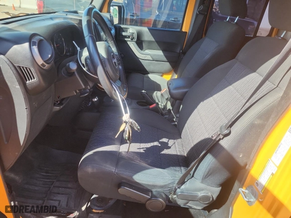 2012 Jeep Wrangler Unlimited Sport with VIN 1C4BJWDG8CL207111, listed as a Copart auction lot 51208395 with 87,926 mi miles and Salvage Title. Bid and sale history available at carsss.com. Image 7.