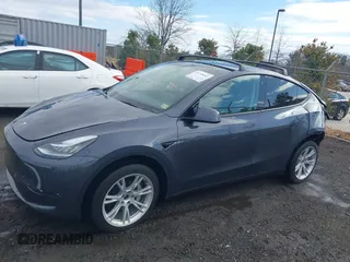 2023 Tesla Model Y Long Range with VIN 7SAYGDEE8PF599254, listed as a IAAI auction lot 41718342 with 24,339 mi miles and . Bid and sale history available at carsss.com. Image 15.