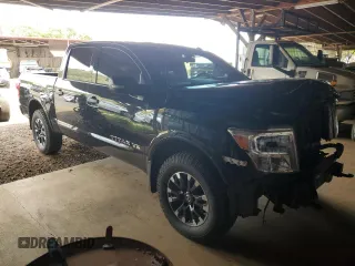 2018 Nissan Titan Pro-4X z VIN 1N6AA1E51JN531463, wystawiony jako Copart lot #52995885 z przebiegiem 62 873 mil mil oraz Szkoda całkowita • Salvage title. Historia ofert i sprzedaży dostępna na DreamBid. Obrazek 4.