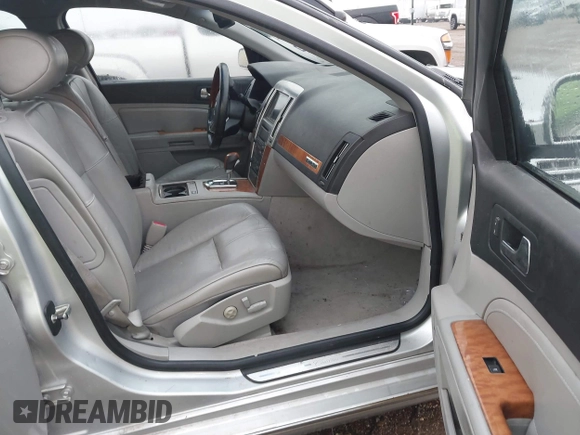 2010 Cadillac STS AWD z VIN 1G6DU6EV4A0114410, wystawiony jako IAAI lot #41301240 z przebiegiem 120 023 mil mil oraz . Historia ofert i sprzedaży dostępna na DreamBid. Obrazek 5.