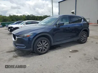 2018 Mazda CX-5 Grand Touring with VIN JM3KFADM8J1349372, listed as a Copart auction lot 63437845 with 62,261 mi miles and Salvage title. Bid and sale history available at DreamBid. Image 1.