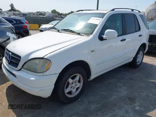 2001 Mercedes-Benz M 320/430/500 with VIN 4JGAB54E11A277233, listed as a IAAI auction lot 42519040 with 307,219 mi miles and . Bid and sale history available at DreamBid. Image 2.