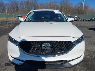 2017 Mazda CX-5 Grand Touring with VIN JM3KFBDL6H0188517, listed as a IAAI auction lot 41093178 with 98,831 mi miles. Bid and sale history available at carsss.com. Image 12.