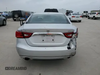 2017 Nissan Maxima S с VIN 1N4AA6AP8HC404521, выставлен на аукционе Copart как лот 50867305 с пробегом 117 312 миль миль и Списание • Salvage title. История ставок и продаж доступна на DreamBid. Изображение 6.