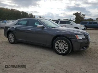 2014 Chrysler 300 C with VIN 2C3CCAKT6EH109281, listed as a Copart auction lot 79534984 with 183,148 mi miles and Salvage Title. Bid and sale history available at DreamBid. Image 4.