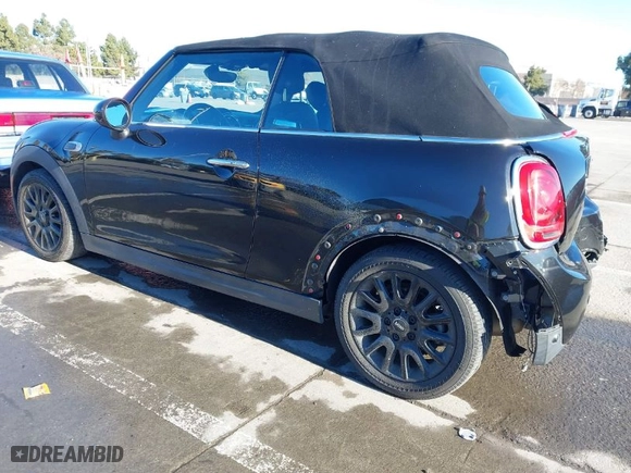 2019 MINI Cooper Convertible with VIN WMWWG5C59K3D01765, listed as a IAAI auction lot 41381003 with 53,760 mi miles. Bid and sale history available at carsss.com. Image 3.