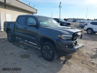 2023 Toyota Tacoma 4WD SR with VIN 3TMCZ5AN8PM574766, listed as a IAAI auction lot 40663003 with 43,978 mi miles. Bid and sale history available at carsss.com. Image 1.