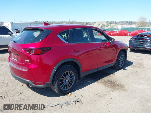 2019 Mazda CX-5 Sport with VIN JM3KFBBM6K1596402, listed as a IAAI auction lot 41971766 with 60,396 mi miles and . Bid and sale history available at DreamBid. Image 4.