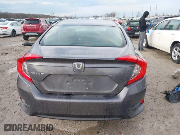 2016 Honda Civic Sedan LX with VIN 19XFC2F52GE009350, listed as a IAAI auction lot 41907696 with 141,306 mi miles. Bid and sale history available at carsss.com. Image 17.