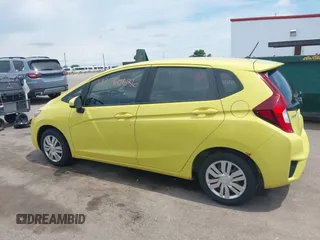 2015 Honda Fit LX z VIN 3HGGK5H58FM768970, wystawiony jako IAAI lot #42760686 z przebiegiem 89 531 mil mil oraz . Historia ofert i sprzedaży dostępna na DreamBid. Obrazek 14.