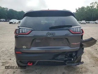 2022 Jeep Cherokee Trailhawk с VIN 1C4PJMBX1ND529146, выставлен на аукционе Copart как лот 56237365 с пробегом 26 718 миль миль и Списание • Salvage title. История ставок и продаж доступна на DreamBid. Изображение 6.