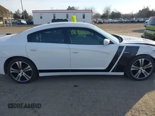 2014 Dodge Charger SXT with VIN 2C3CDXHG6EH359856, listed as a IAAI auction lot 41631987 with 144,355 mi miles and . Bid and sale history available at DreamBid. Image 13.