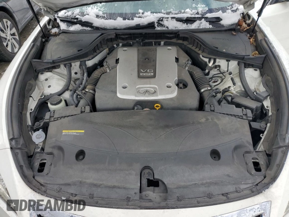 2015 Infiniti Q70 z VIN JN1BY1AR7FM560994, wystawiony jako Copart lot #86988034 z przebiegiem 92 028 mil mil oraz Szkoda całkowita • Salvage title. Historia ofert i sprzedaży dostępna na DreamBid. Obrazek 11.