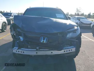 2022 Honda Pilot Special Edition with VIN 5FNYF5H25NB031399, listed as a IAAI auction lot 41638517 with 34,239 mi miles and . Bid and sale history available at carsss.com. Image 6.