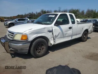 2004 Ford F-150 XL with VIN 2FTRX17W54CA63466, listed as a Copart auction lot 64022895 with 329,377 mi miles and Salvage title. Bid and sale history available at DreamBid. Image 1.