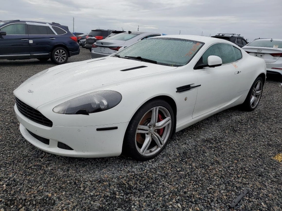 2011 Aston Martin DB9 with VIN SCFFDAAE8BGA13186, listed as a Copart auction lot 74703544 with 0 mi miles and Salvage Title. Bid and sale history available at carsss.com. Image 1.