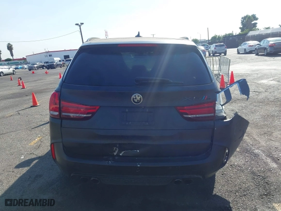 2016 BMW X5 M with VIN 5YMKT6C51G0R79331, listed as a IAAI auction lot 40590865 with 80,772 mi miles. Bid and sale history available at carsss.com. Image 16.