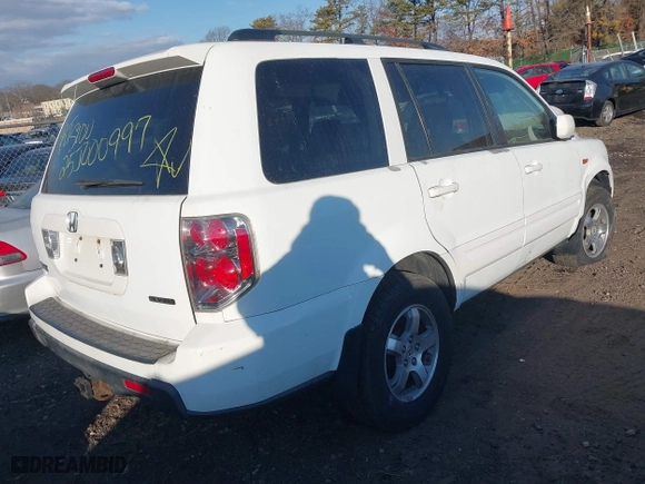 2006 Honda Pilot EX-L with RES with VIN 5FNYF18686B010429, listed as a IAAI auction lot 41444366 with 999,999 mi miles. Bid and sale history available at carsss.com. Image 4.
