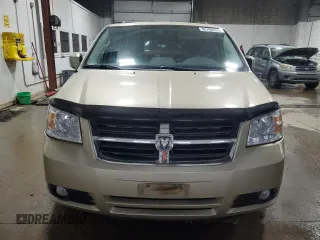 2010 Dodge Grand Caravan Crew with VIN 2D4RN6DX7AR463122, listed as a Copart auction lot 48768635 with 102,497 mi miles and Salvage Title. Bid and sale history available at DreamBid. Image 5.
