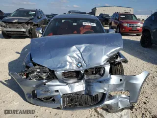 2011 BMW 1 Series 135i with VIN WBAUC9C59BVM11260, listed as a Copart auction lot 86721684 with 56,914 mi miles and Salvage Title. Bid and sale history available at carsss.com. Image 5.