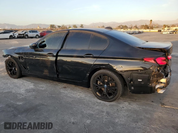 2023 BMW 5 Series 530e with VIN WBA13AG02PCN09018, listed as a Copart auction lot 85255124 with 34,015 mi miles and Clean title. Bid and sale history available at DreamBid. Image 2.