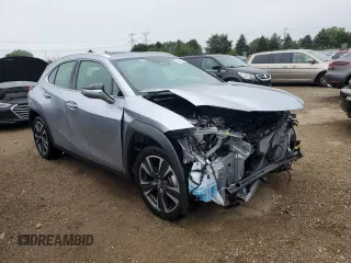 2025 Lexus UX with VIN JTHUCJDH3S2001129, listed as a Copart auction lot 65140554 with 875 mi miles and Salvage Title. Bid and sale history available at carsss.com. Image 4.