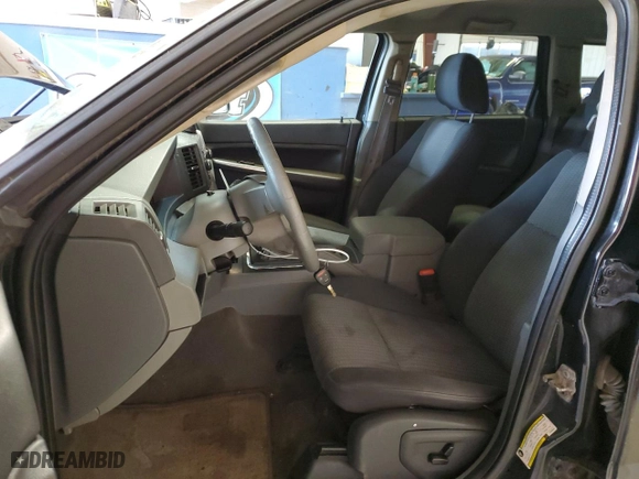 2007 Jeep Grand Cherokee Laredo with VIN 1J8GR48K07C643354, listed as a Copart auction lot 51635435 with 164,444 mi miles and Salvage Title. Bid and sale history available at carsss.com. Image 7.