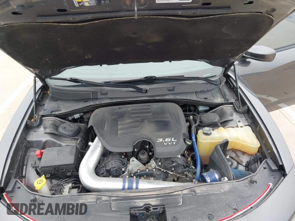 2018 Dodge Charger SXT Plus with VIN 2C3CDXHG0JH217495, listed as a IAAI auction lot 41998783 with 58,247 mi miles and . Bid and sale history available at carsss.com. Image 10.