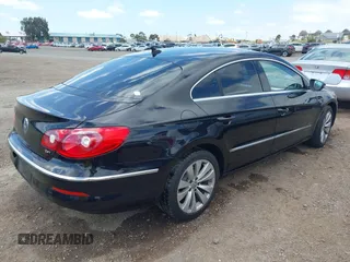 2012 Volkswagen CC Sport PZEV with VIN WVWMP7AN3CE516747, listed as a IAAI auction lot 42150237 with 125,157 mi miles. Bid and sale history available at carsss.com. Image 4.