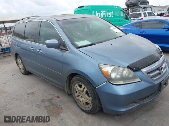 2007 Honda Odyssey EX-L with VIN 5FNRL38717B127157, listed as a IAAI auction lot 41890838 with 195,241 mi miles and . Bid and sale history available at DreamBid. Image 1.