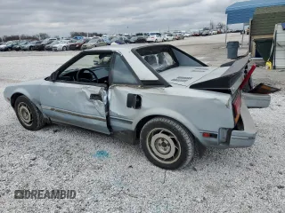 1989 Toyota MR2 z VIN JT2AW15C2K0146245, wystawiony jako Copart lot #87315874 z przebiegiem 162 741 mil mil oraz Tytuł czysty. Historia ofert i sprzedaży dostępna na DreamBid. Obrazek 2.