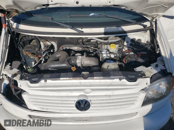 2003 Volkswagen EuroVan MV с VIN WV2MB47053H012029, выставлен на аукционе Copart как лот 68222234 с пробегом 247 494 миль миль и Списание • Salvage title. История ставок и продаж доступна на DreamBid. Изображение 12.
