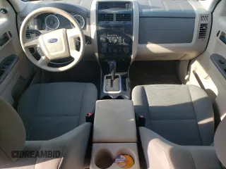 2010 Ford Escape XLS with VIN 1FMCU0C76AKB82752, listed as a Copart auction lot 57626565 with 194,931 mi miles and Salvage title. Bid and sale history available at DreamBid. Image 8.