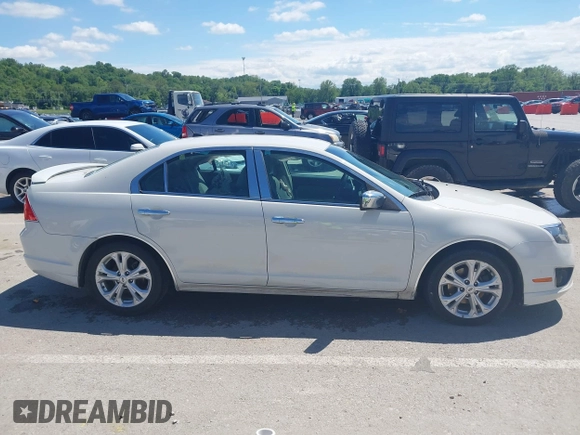 2012 Ford Fusion SE с VIN 3FAHP0HAXCR373441, выставлен на аукционе IAAI как лот 42213666 с пробегом 117 313 миль миль и . История ставок и продаж доступна на DreamBid. Изображение 13.