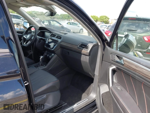 2024 Volkswagen Tiguan with VIN 3VVTB7AX9RM218526, listed as a IAAI auction lot 42564195 with Not provided miles and . Bid and sale history available at DreamBid. Image 5.