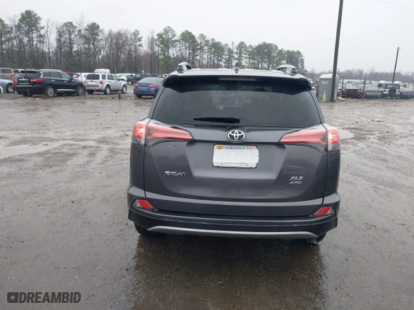 2018 Toyota RAV4 XLE with VIN 2T3RFREV5JW798328, listed as a IAAI auction lot 41868104 with 61,076 mi miles. Bid and sale history available at carsss.com. Image 16.