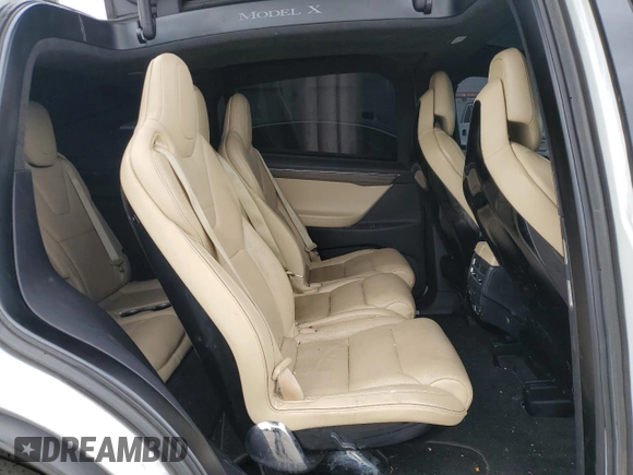 2016 Tesla Model X 70D z VIN 5YJXCAE2XGF003344, wystawiony jako Copart lot #53123305 z przebiegiem 126 052 mil mil oraz Szkody całkowita. Historia ofert i sprzedaży dostępna na DreamBid. Obrazek 11.