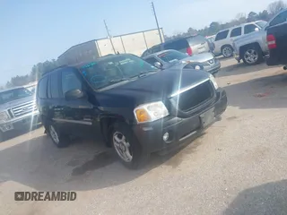 2006 GMC Envoy SLT with VIN 1GKDS13S062234137, listed as a IAAI auction lot 41561864 with 221,031 mi miles. Bid and sale history available at carsss.com. Image 1.